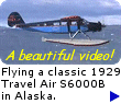 Flying the historic 1929 Travel Air S6000B in  Alaska.         New window not opening? To bypass your pop-up blocker program, hold down your [CTRL] key when clicking.